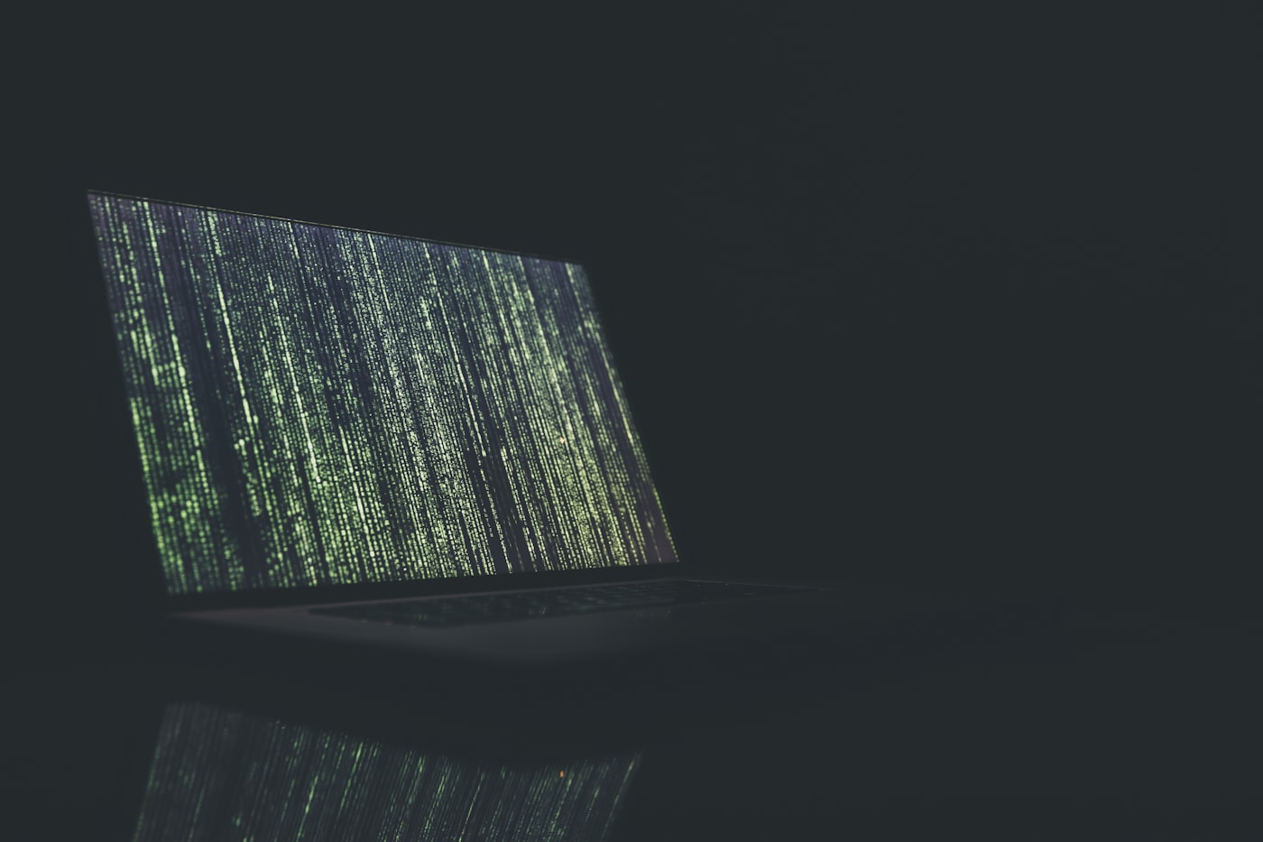 Security operations team monitoring web application threat alerts and access logs on multiple screens